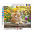 Sonniges Katzchen im Blumenmeer - Diamond Painting